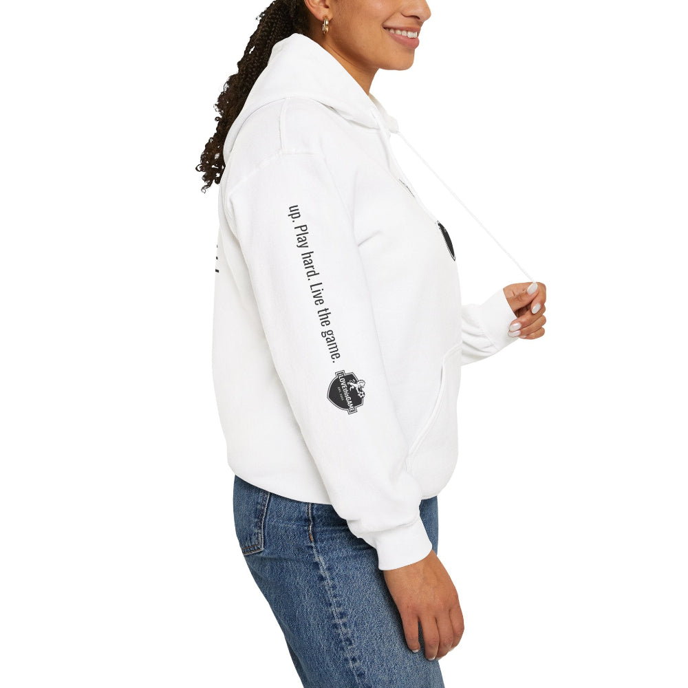 Lady wearing an iLOVEthisGAME white high quality fleece hoodie and soccer cleats