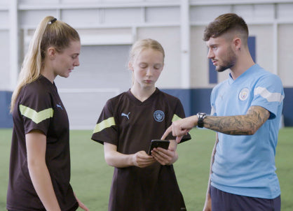 Young players meeting with the Manchester City team while training with Playermaker and CITYPLAY